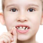 Sonhar com Dente Nascendo Loteria